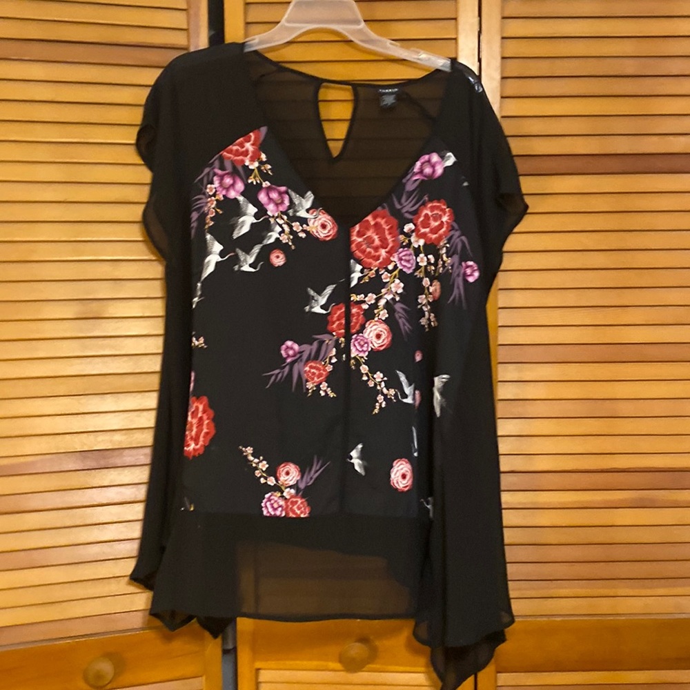 Torrid black flowing top with artwork details